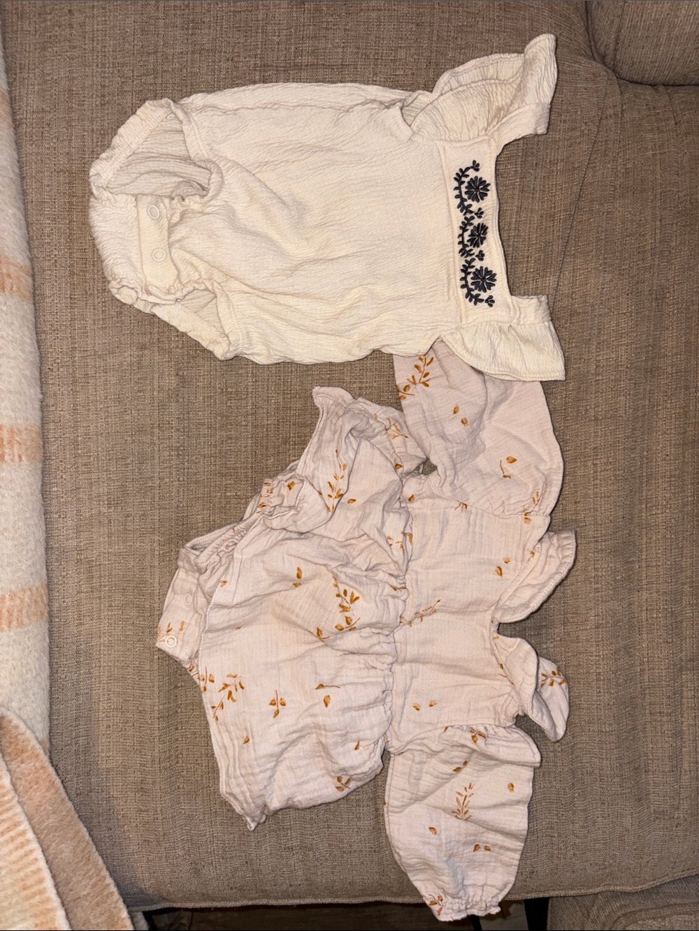 Two newborn onesies